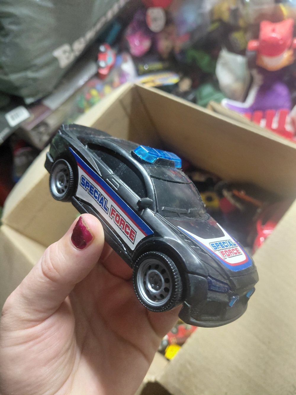 black "Special Force" police car from the Adventure Force Rescue Station Playset